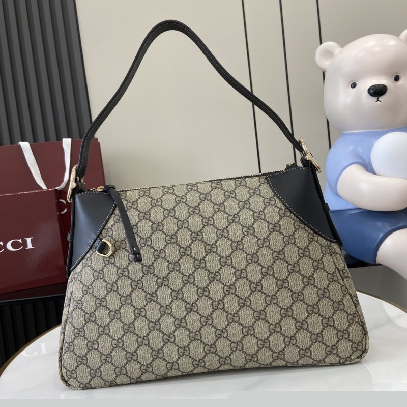 G*u*i shopping bags